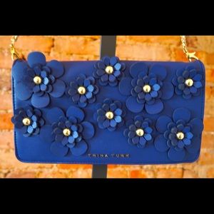Trina Turk Blue Floral Appliqué clutch